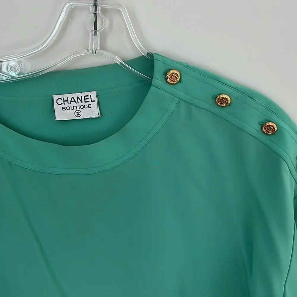 Chanel short-sleeve blouse with 4 monogrammed shoulder buttons